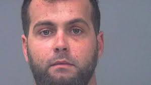 Driver charged in passenger's death