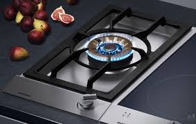So how does induction cooking work? Gaggenau Vg231214ca 12 Inch Gas Modular Wok Cooktop With 3 Ring 17 000 Btu Brass Burner Cast Pan Support One Handed Operation And Safety Thermocouple Ignition Gaggenau Cooktop Oven And Hob