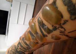 Mickey, word, heart, bunny tattoo. Undrawing My Tattoos Bbc News