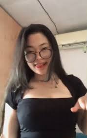 Sexy Asian woman showing curves