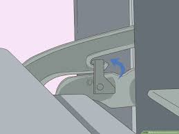 Start by applying a pair of gloves and using a slot screwdriver to unlock the tabs (or hinge latches) on either side of the door. 3 Ways To Remove An Oven Door Wikihow