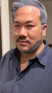 Last minute Halloween costume idea (and all you need is colourful glasses,  a bead necklace, double denim and a firm grip).