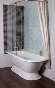 Decorative shower curtains are a great option if you tend to use the bathtub more frequently than the shower, or if you're looking for a way to spruce up your guest bathroom. Bathroom Impressive Freestanding Tubs For Your Contemporary Bathroom Ideas Freestanding Bathtub Shower Bathtub Shower Combo Freestanding Tub Shower