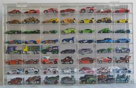 Is your place for all your sports display case needs. Amazon Com 1 64 Scale Toy Cars Wheels Matchbox Display Case Wall Cabinet Rack 56 Compartment Hot Ahw64 56 Toys Games