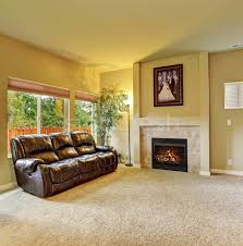 How can a modern fireplace enhance the warm feel of a space? Cozy Living Room With Carpet And Fireplace Stock Photo C Iriana88w 5796324 Stockfresh