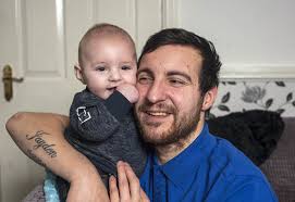 Dad in a coma miraculously wakes up after visit from newborn son