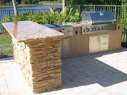 Outdoor Grill Islands Custom Outdoor Kitchen In Florida With Granite And Ledge Stone And Bar Outdoor Kitchen Island Outdoor Bbq Built In Bbq Grill