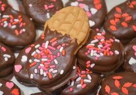Salted dark chocolate dipped peanut butter cookies ~ give regular peanut butter cookies an easy, elegant and amazingly tasty flair with a dunk in chocolate and a sprinkling of sea salt. Chocolate Covered Peanut Butter Cookies Jersey Girl Cooks