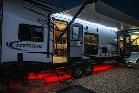 Torque Toyhaulers Light Up The Night With Their Exterior Led Light Package How Many Of You Are Fans Of The Red Led Lights Recreational Vehicles Toy Hauler