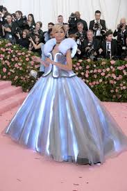 Zendaya is doing magic tricks in a glowing cinderella gown at the 2019 met gala right now. Zendaya Coleman Wore A Cinderella Tommy Hilfiger Dress To Met Gala 2019 Red Carpet