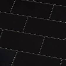 Flooring tile has to be safe to walk on, and a glossy floor kitchen tile could be unsafe under foot. Trentie Black Gloss Metro Ceramic Wall Tile Pack Of 40 L 200mm W 100mm Diy At B Q