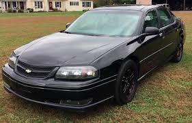 Image result for Black 2005 Impala