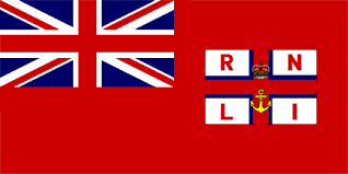 Royal national lifeboat institution rnli flag flying above the lifeguard station in southwould, uk. United Kingdom Royal National Lifeboat Institution