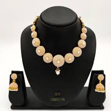 Antique gold choker necklace with jhumki earrings and tikka. Round Shape Pearl Choker Necklace Set