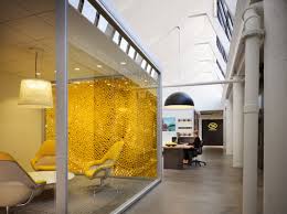 One More Of Mike S Lemonade Corporate Office The Wall Of Lemons I Love It Behind Glass So Cr Corporate Interiors Office Interiors Office Interior Design