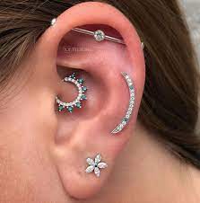 The Ultimate Guide On Industrial Piercings With Amazing Photos Everything You Need To Know Tats N Rin Earings Piercings Ear Jewelry Daith Piercing Jewelry
