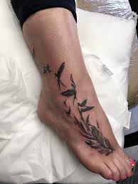 Wraparound the ankle/foot area is a wonderful and super popular location for female tattoos, and we love this unique, detailed wraparound tattoo. A Feminine Tattoo Feather And Mj Tattoo Art Studio Facebook