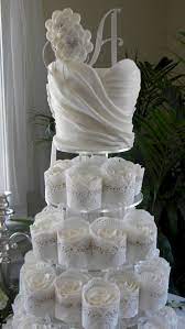 10 Awesome Wedding Cake Ideas For Wedding Party Wedding Dress Cupcakes Bridal Shower Cakes Ruffle Wedding Cake