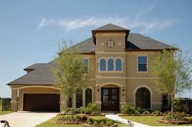 Stucco traditionally is painted a neutral color like this tan beauty from josephpauldavis but there. Ten Easy Steps When Choosing Stucco Colors House Paint Exterior Exterior Paint Colors For House Stucco House Colors