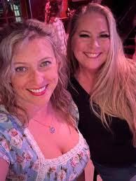 Just two single gals, wanting someone to ask us to dance…single