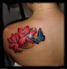 Flowers And Butterfly Butterfly Tattoo On Shoulder Shoulder Cover Up Tattoos Lily Tattoo Design