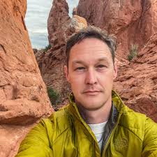 Reclaimed barn beam floor installation progress
