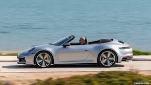 The porsche motorsport department is presenting weissach's latest treat at the geneva motor show: 2020 Porsche 911 Carrera S Cabriolet Color Gt Silver Metallic Side Caricos