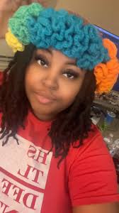 Hi! This is my first post in the group, but I wanted to share this ruffle  hat that I made using a rainbow cake that I found