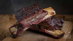 Place ribs on a wire cooling rack inside of a cookie sheet. Short Ribs From The Rotisserie Bbq Heroes