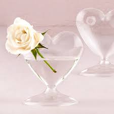 From our best selling dimple glasses to our exciting ring glasses, enjoy your favorite beverage in a fun and stylish piece of blenko. 4 Pc Miniature Clear Blown Glass Heart Table Vase Set
