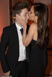 Empire of victoria beckham ›› виктория бекхем. Victoria Beckham Smothers Son Brooklyn With Love David And Victoria Beckham The Beckham Family Victoria Beckham