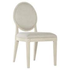 This graceful chair is upholstered in a natural fabric and is fabric content: Alice Modern Classic Grey Upholstered Oval Back Dining Side Chair Kathy Kuo Home