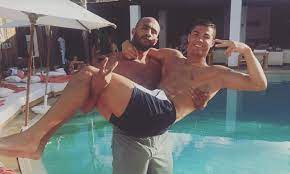 The real madrid striker and bff badr hari have shared a series of snaps of their recent bromantic holiday. Cristiano Ronaldo Gets Swept Up In The Arms Of Badr Hari On Holiday Daily Mail Online