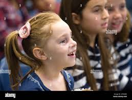 Piper Bohling, 5, left, and Rylee Davis, 8, and Chloe Davis, 9, enjoy Magic  Grandpa's magic