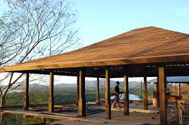 A timber roof truss is a structural framework of timbers designed to bridge the space above a room and to provide support for a roof. Timber Artisans Llc