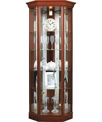 Keepsakes corner curio cabinet this keepsakes corner curio cabinet in oak finish is crafted from hardwood solids and veneers for good durability. Pin Di Home Decor That I Love