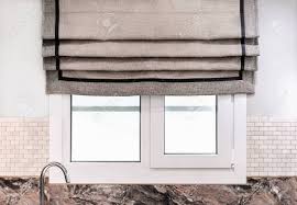 linen roman curtains or fabric blinds