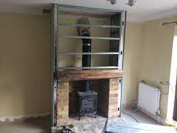 Wood, kindling, and other materials that may travel up the chimney must be at a minimum of two inches away from the outer part of the chimney. Pin On House