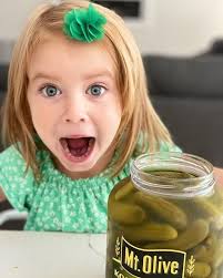 🤩 She may be little, but she has a BIG love for pickles! 🥒 Since 2021,  we've been receiving the cutest photos of our awesome pickle fan, Olivia!  🥒 From her family: “