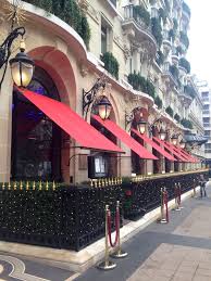 the iconic red awnings of the hotel plaza athenee paris france paris hotels paris hotel