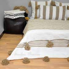 moroccan pompom blanket moroccan blanket boho blanket etsy in 2021 moroccan blankets moroccan throw blanket moroccan pom pom blanket