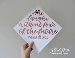 She Laughs Without Fear Of The Future Proverbs 31 25 Custom Graduation Cap Letterin Custom Graduation Caps College Graduation Cap Decoration Diy Graduation Cap