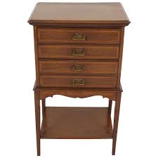 In the most simple context, it is an enclosure for drawers in which items are stored. Antique Art Nouveau Inlaid Mahogany 4 Drawer Music Filing Cabinet 1910 B2149 At 1stdibs