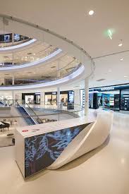 Beaugrenelle Shopping Centre Information Booth Material Hi Macs Alpine White Fiery Red Location Pa Shopping Mall Design Counter Design Mall Design