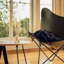 Pink butterfly chair combines durability with artistic style. Cuero Mariposa Butterfly Chair Coloured Leather Ambientedirect