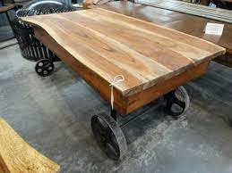 Industrial furniture swivel metal castors casters caster wheels coffee table wheels circle graphite 7,6 cm. Industrial Coffee Table Features A Refined Live Edge Wood Top
