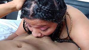 Rich chubby girl with braids eating a cock until she gets stuck with it,  she gives a rich homemade blowjob looking at the camera in the amateur porn  video, she shows her