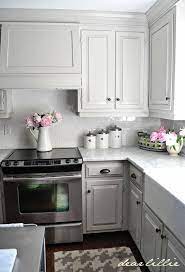 Light grey color kitchen cabinets. 12 Gorgeous And Bright Light Gray Kitchens Table And Hearth Kitchen Cabinets Decor Kitchen Cabinet Design Light Grey Kitchens