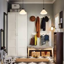 Clear Your Entryway Of Clutter With The Ikea Pax Wardrobe For Extra Storage And Wall Hooks For Coats Backpacks And More Ikea Hallway Pax Wardrobe Home Decor