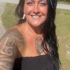 Can someone help a woman get her boat unstuck in the Cedar Key marsh after  Hurricane Debi?